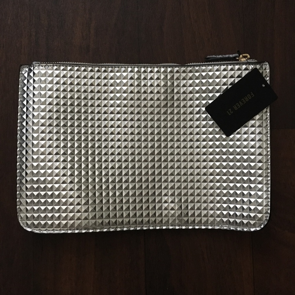 NWT F21 metallic silver clutch, geometric textured